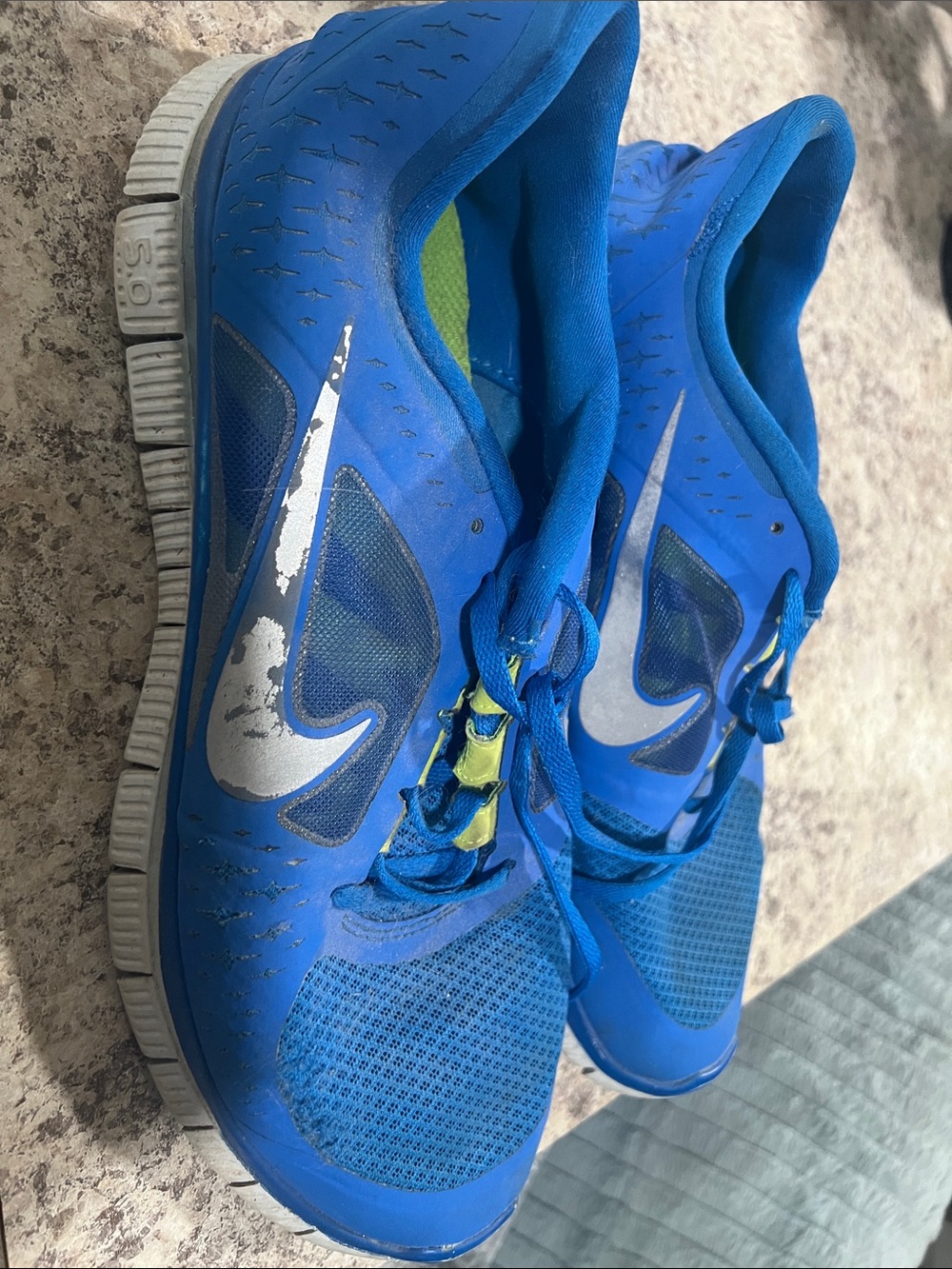 Nike Blue Athletic Sneakers with White Swoosh